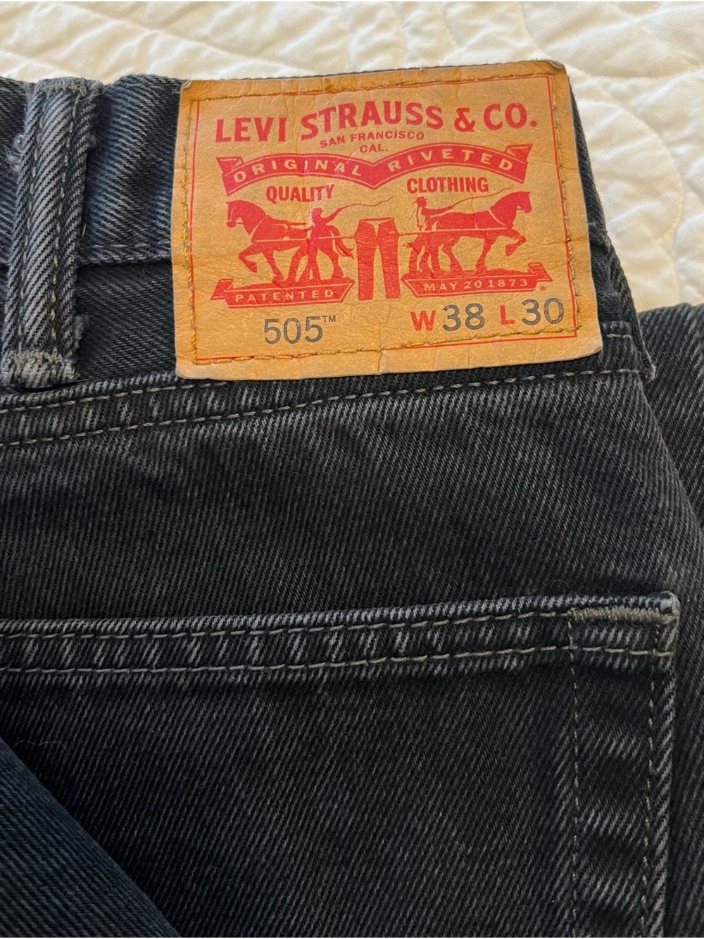 Levi's 505 Relaxed Fit Men's Jeans in Black Denim with Tan Patch